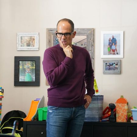 Marcus Lemoni talking with his co workers.